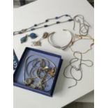 A Collection of silver necklaces & pendants to include two silver bangles & white metal and Lapis