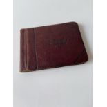 An old autograph album containing various poems, sayings & doodles