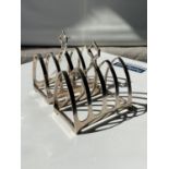 A pair of Edinburgh silver 4 slice toast rack's [Henry Tatton] [dated, 1934] [7.8 x 8 x 4.6cm] [