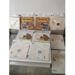 A COLLECTION OF 'THE ROYAL MINT' TREASURY FOR LIFE 50 PENCE COINS. TO INCLUDE TWO SEALED