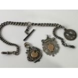 An antique silver Albert chain, T- Bar & Birmingham silver Masonic fob medal set with a blue