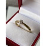 An 18ct gold ladies single diamond ring [0.15ct] [size P] [2.87g]