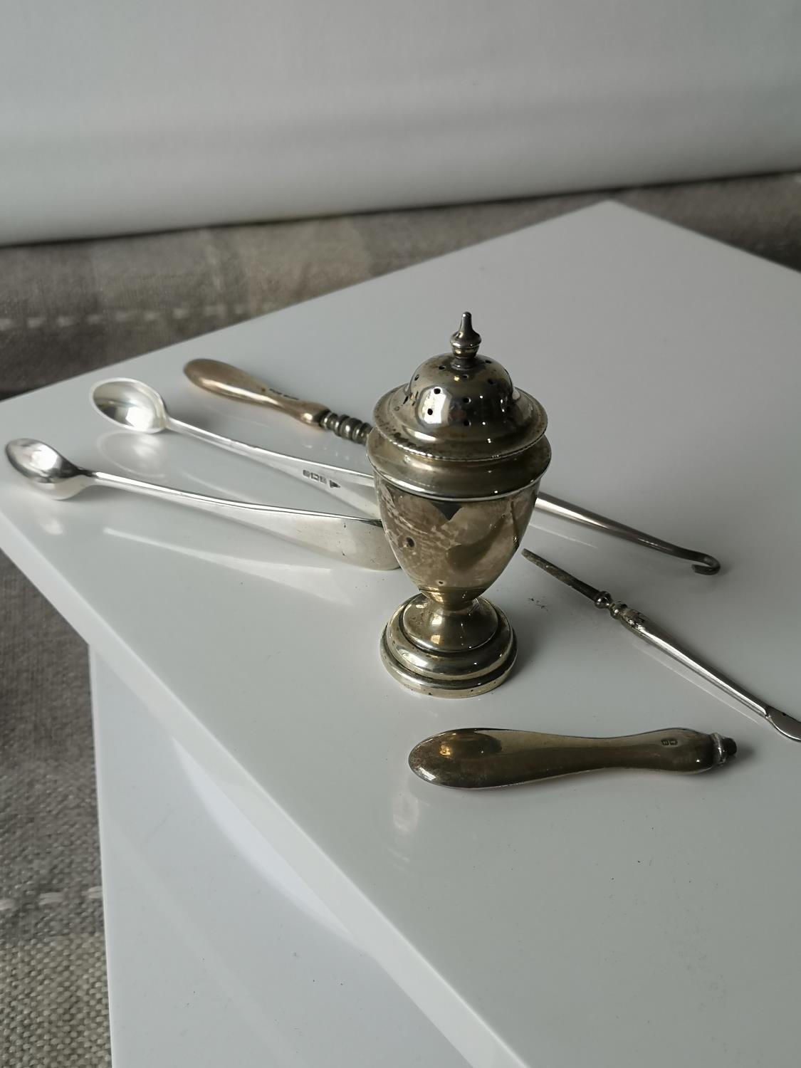 A Birmingham silver sugar pot, two silver handle items & Sheffield silver sugar tongs.