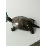 An antique heavy bronze turtle sculpture with silver shell inlay. [3.5x12.5x7cm]