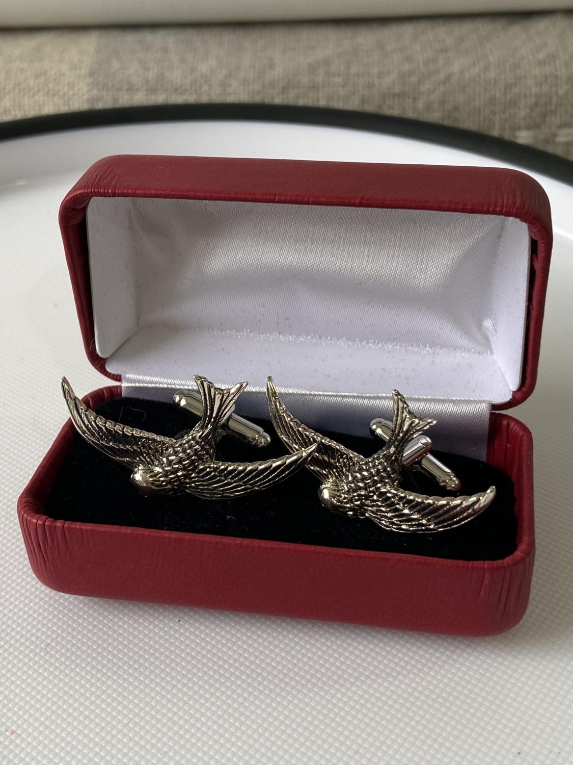 A pair of Sterling silver swallow cufflinks