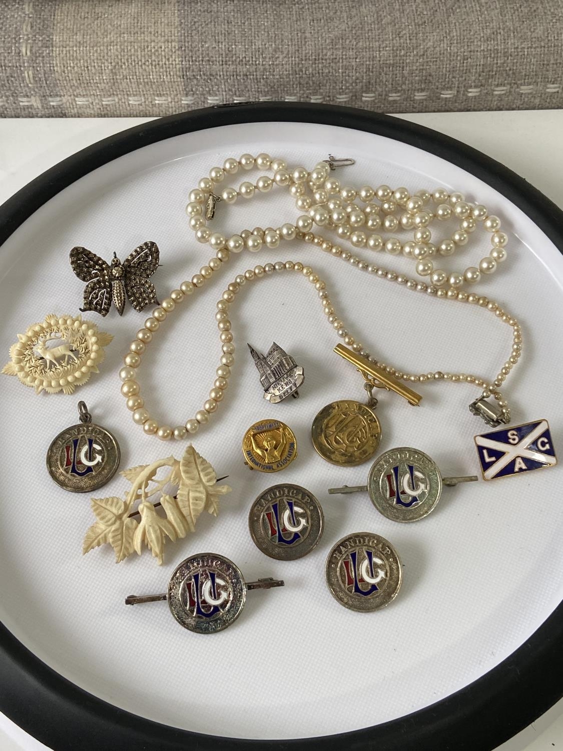 A selection of various vintage badges to include; a gold & enamel 'Soroptimist International