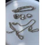 3 various silver rings, a silver gate bracelet and a silver rope necklace