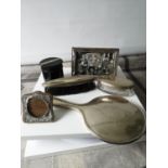 A Silver hand brush, mirror, silver lid and glass base dressing table preserve pot, ebony & silver