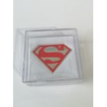 A 1oz silver and enamel superman ingot.