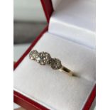 An 18ct gold [tested] diamond cluster ring [0.50ct] [size, O] [3.29g]