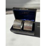 A pair of boxed Edimburgh silver napkin rings [Brook & Son], both engraved [84g]