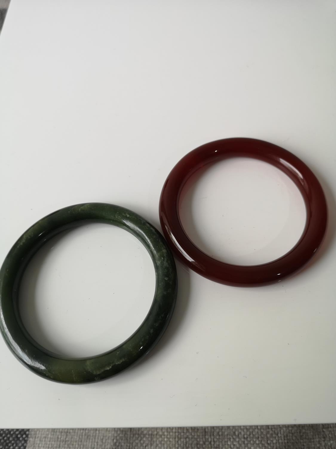 Two Chinese jade bangles.