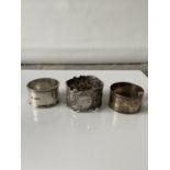 3 silver napkin rings, includes ornate 800 grade napkin ring, Birmingham & Sheffield made napkin