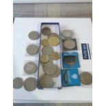 A Tray containg a collection of crowns and two pound coins.