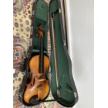 A 3/4 size violin, with one bow and case