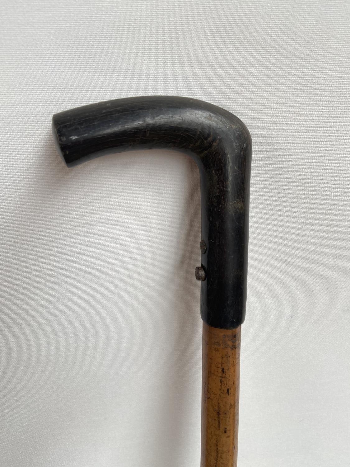 An antique walking cane pistol, designed with a bone handle and bamboo shaft [length, 90cm] - Image 2 of 5