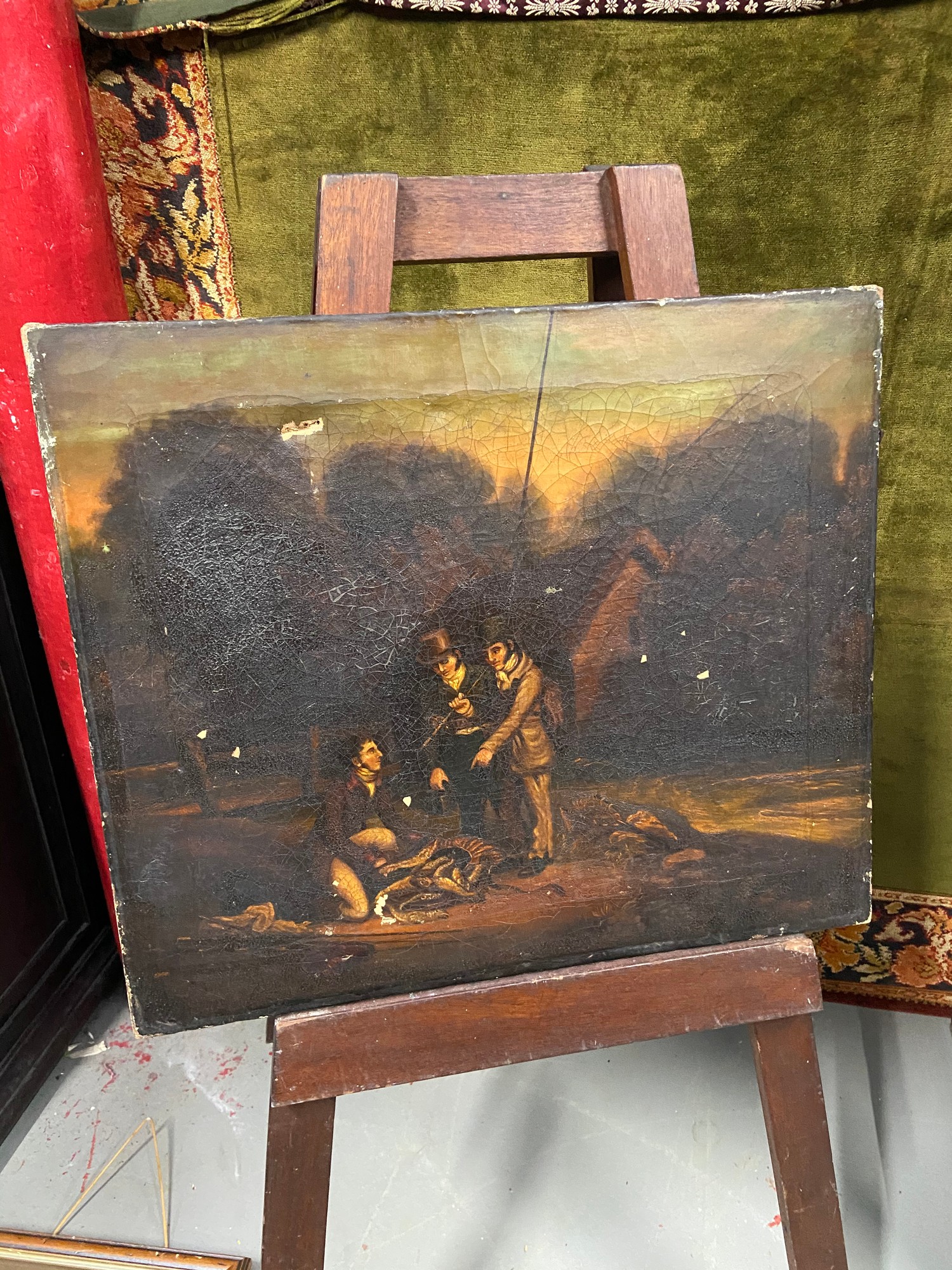 An 18th/ 19th century oil painting on canvas depicting three gentleman discussing their catch. [44.