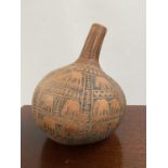 A Large African Tribal hand carved nut water carrier. [36cm in height & 32cm in diameter]