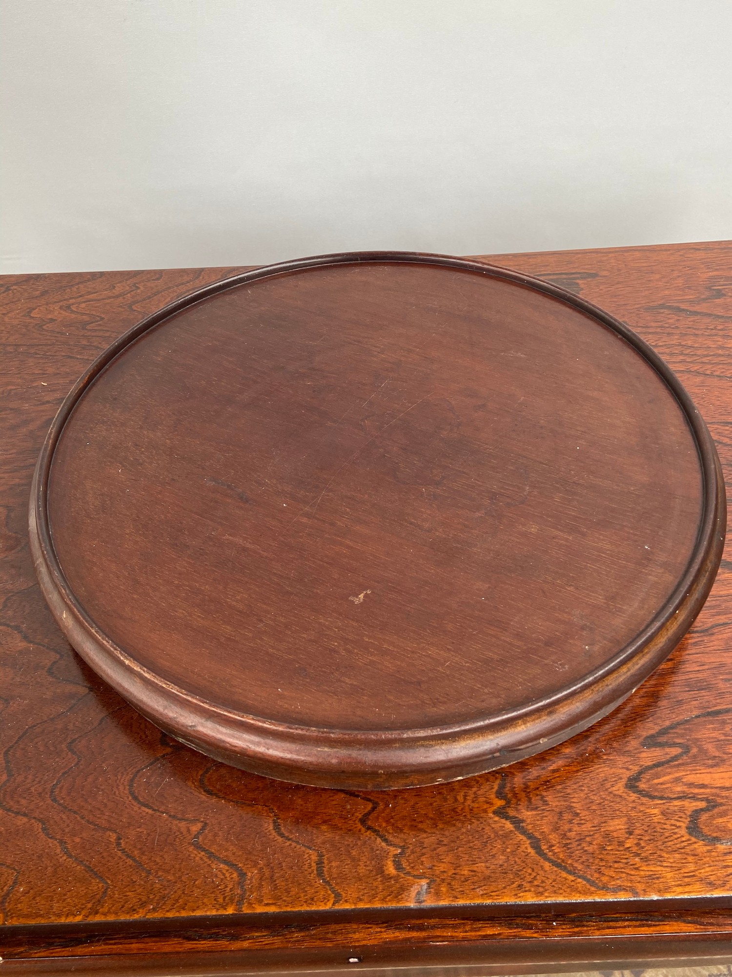 A 19th century mahogany lazy susie. [38cm in diameter]