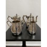 A Victorian four piece ornate tea/ coffee service.