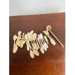 A Collection of antique bone spoons and, seal and ladle.