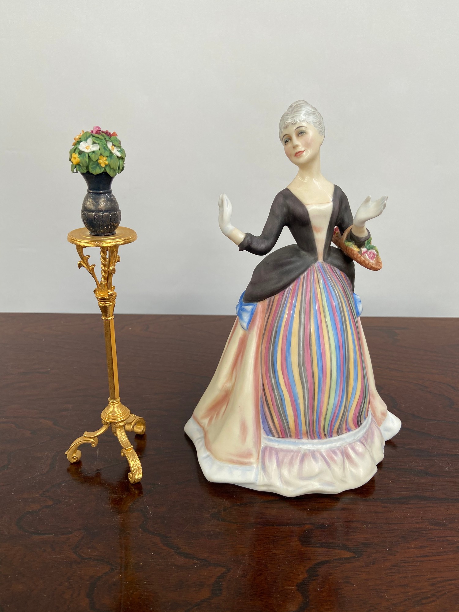 A Royal Doulton Figurine, The gentle arts, Flower Arranging, 542 of 750.