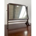 A Georgian table top mirror. Designed with gilt mould trim. [46x44cm]
