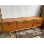 A stylish Retro mid century teak pedestal sideboard. Consisting of three drawers and three doors.