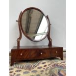 A Victorian dressing table mirror, upon a 3 drawer platform, detailed with ivory handles and a twist