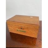 An Antique pine document chest containing a quantity of silver plated cutlery flatwares. Box has