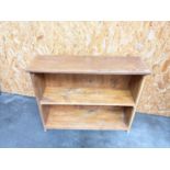 A farmhouse pine two tier bookcase [height, 76cm, length, 96, depth 29cm]