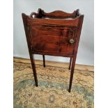 A Georgian side cabinet with single line inlay, tray effect top, raised on tapered legs, opening