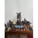 A collection of Lord of The Rings six inch figures, to include; small cast metal figures