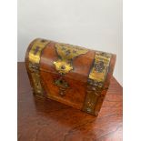 A 19th century bur walnut dome top tea caddy chest. Designed with brass mounts. [17x23x11cm]