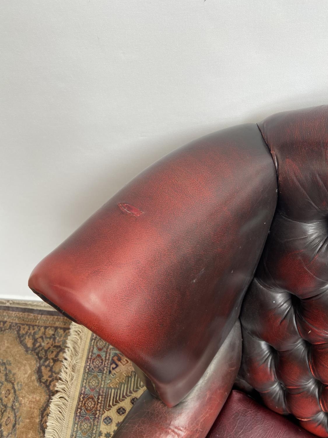 Antique chesterfield oxblood red gull wing arm chair. [107cm in height] - Image 4 of 7