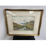 An early 20th century watercolour depicting a mountain and river landscape scene by J.C. Gray of