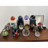 A Collection of various paperweights to include unusual Caithness paperweights.
