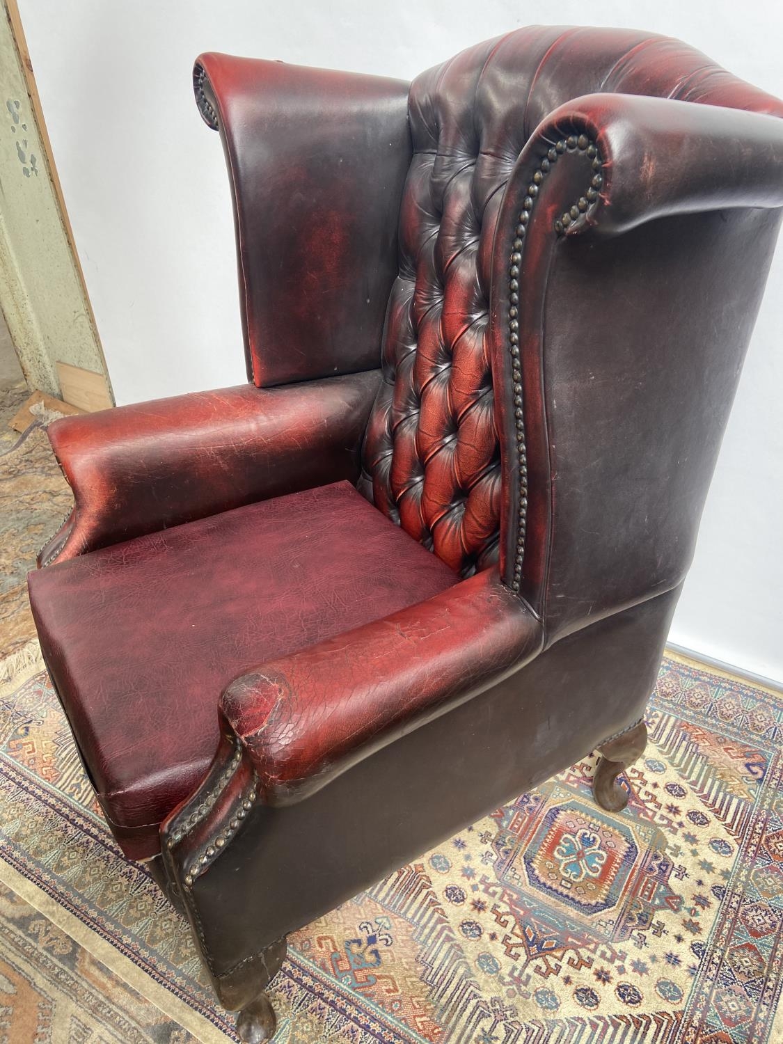 Antique chesterfield oxblood red gull wing arm chair. [107cm in height] - Image 5 of 7