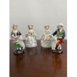 A Lot of four Staffordshire figurines. [15cm in height]