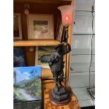 A Victorian Spelter Cavalier figurine table lamp. Designed holding a lance which is topped by the