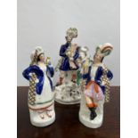 A Lot of three Antique Staffordshire Scottish design figurines. [29cm in height]