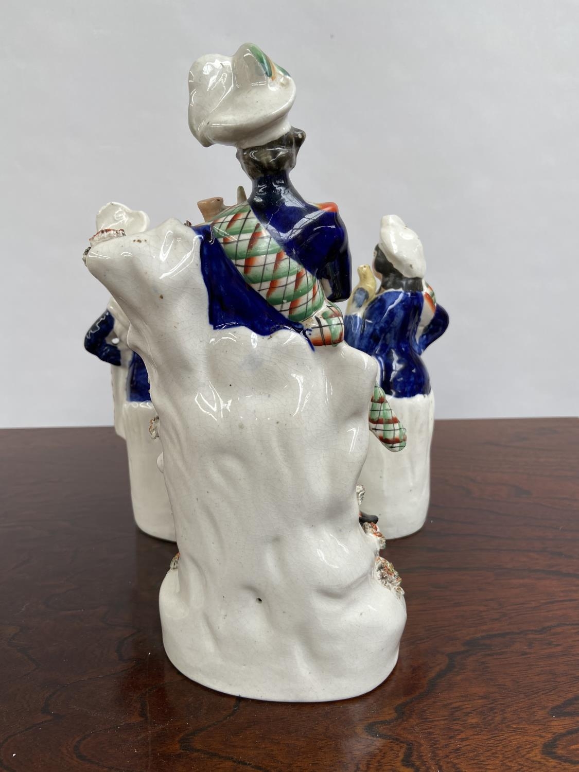 A Lot of three Antique Staffordshire Scottish design figurines. [29cm in height] - Image 3 of 6