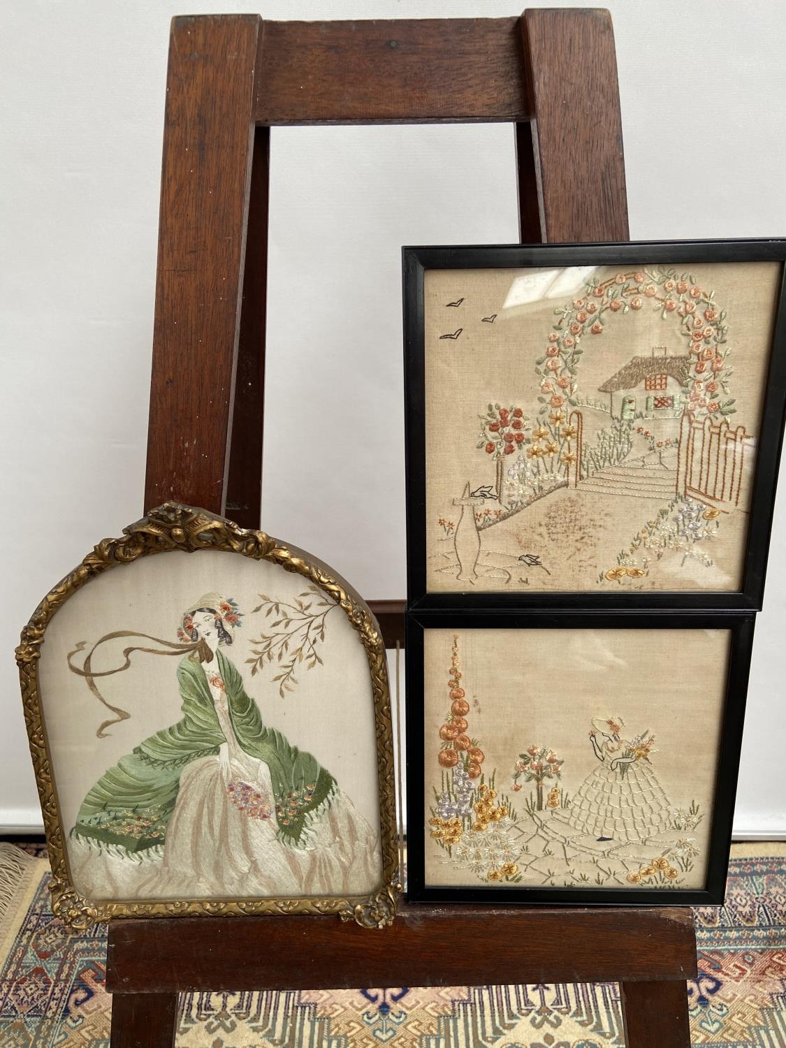 19th century silk tapestry depicting lady, fitted within a moulded gilt frame, together with two