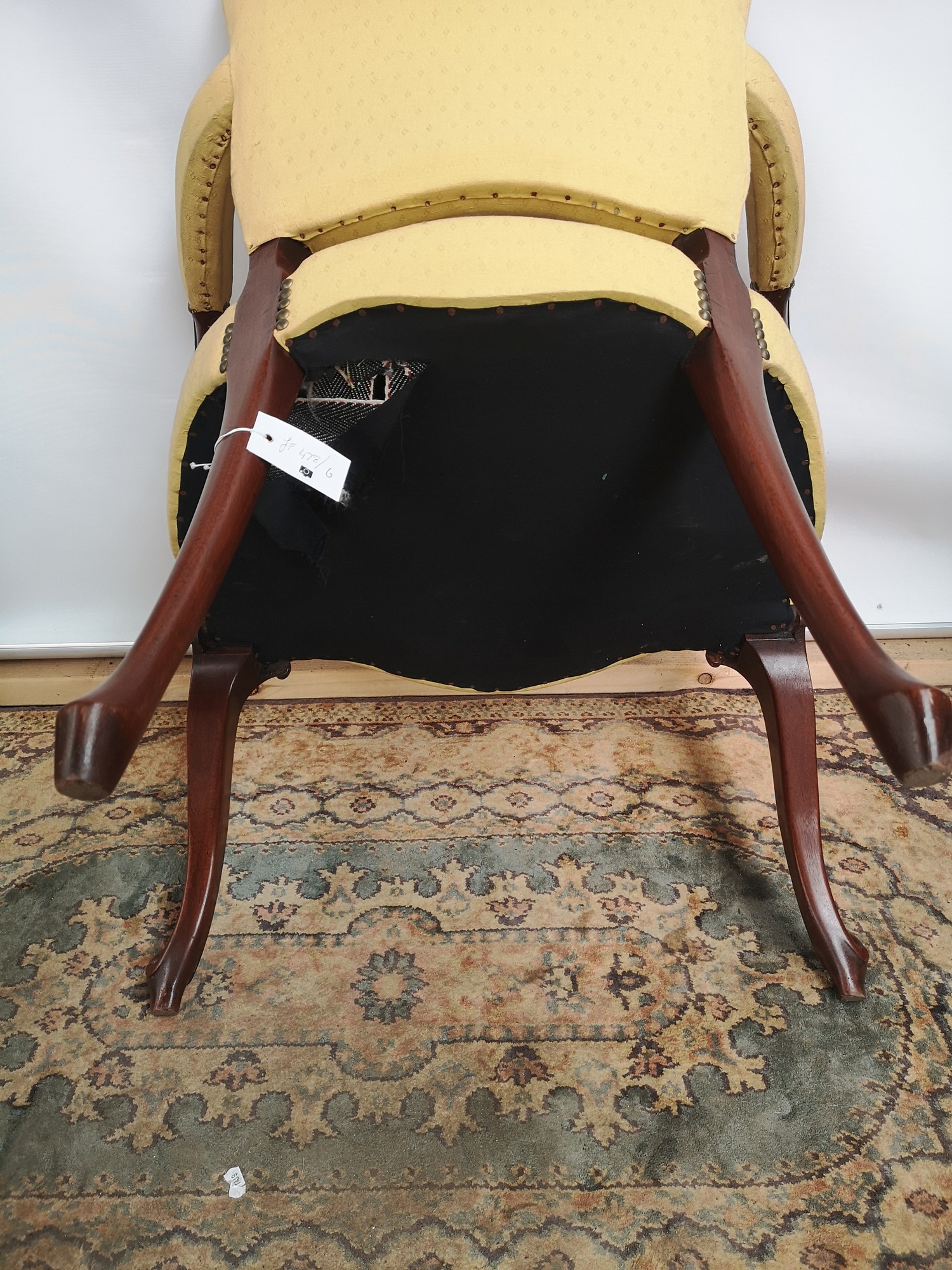 A Victorian arm chair, open scroll arms, supported on cabriole legs and ending in scroll feet [ - Image 4 of 4