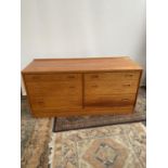 A Retro mid century 'Lucas' teak six drawer wide chest. [66x133x46cm]