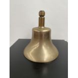 A Heavy antique hand bell. Stamped Greenberg to the inside. [Height 21cm, diameter 19cm]