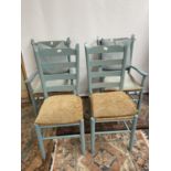 A Lot of four farmhouse dining chairs. Consists of two chairs and two arm chairs. height [105cm]