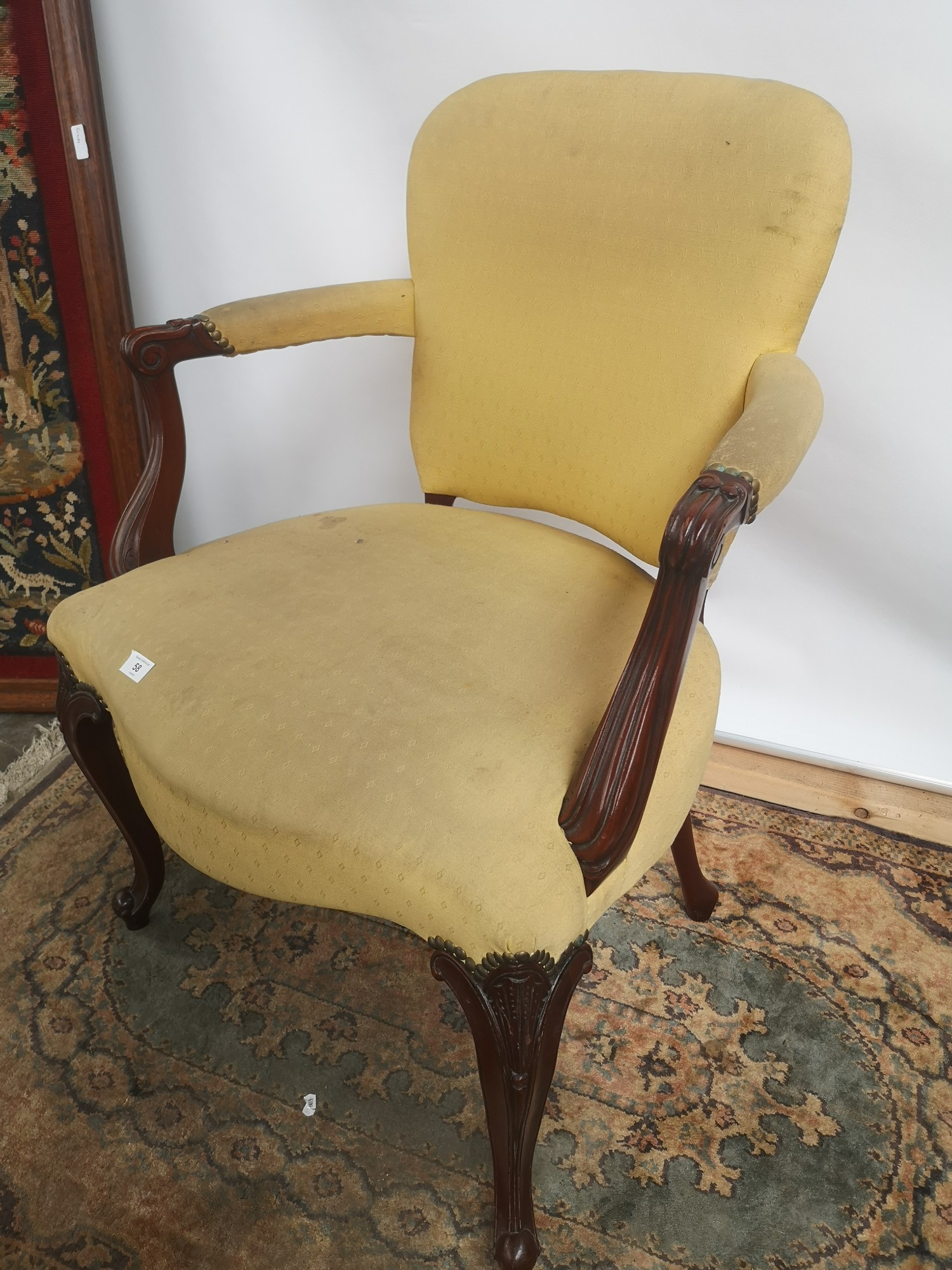 A Victorian arm chair, open scroll arms, supported on cabriole legs and ending in scroll feet [ - Image 3 of 4