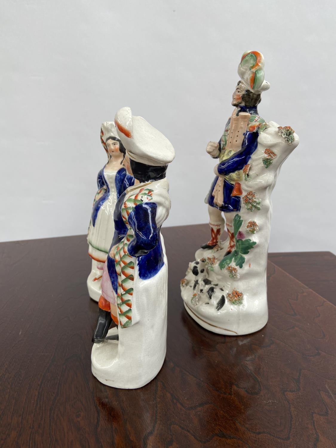 A Lot of three Antique Staffordshire Scottish design figurines. [29cm in height] - Image 2 of 6