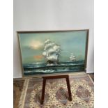 A Large oil painting depicting galleons at sea. Signed Robert. [Frame measures 68x97cm]